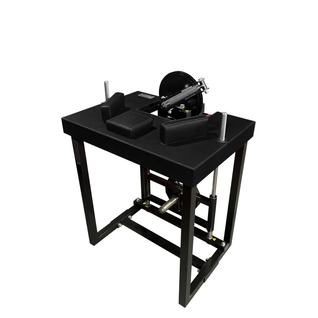 A versatile gym machine designed for isometric exercises, featuring an ergonomic padded platform and an advanced cable resistance system. This strength trainer helps users develop maximum force output by maintaining controlled static contractions, targeting arm and shoulder muscles.